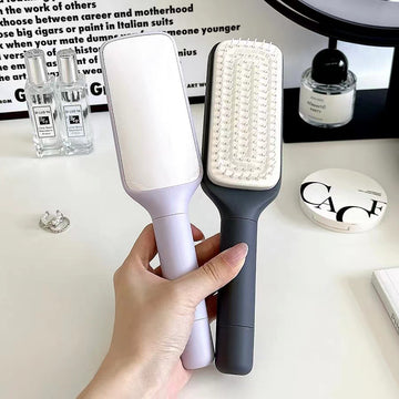 Self Cleaning Rotating Hair Brush